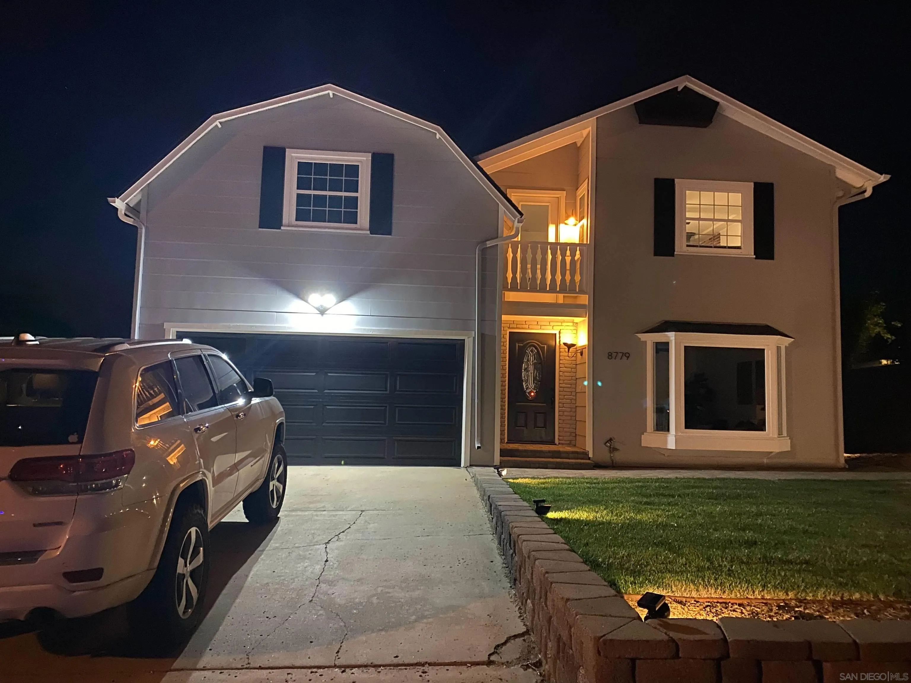 8779 Cordial Road El Cajon, CA 92021 - Photo 2 of 39 a front view of a house with a yard