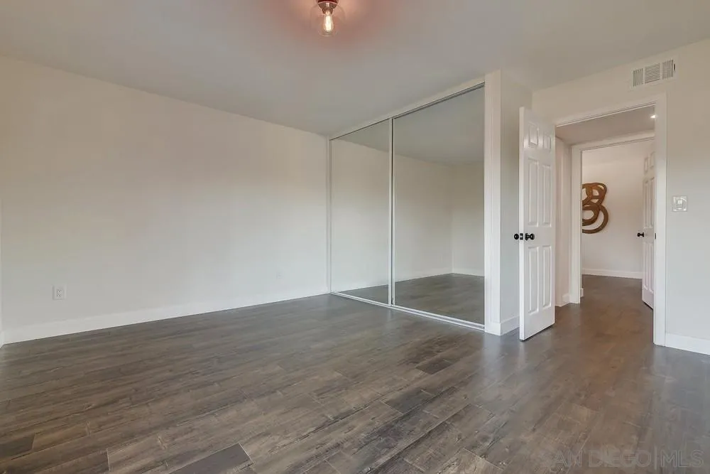 8779 Cordial Road El Cajon, CA 92021 - Photo 28 of 39 wooden floor in an empty room