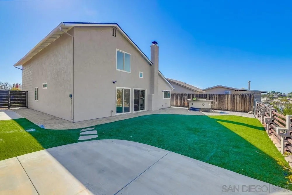 8779 Cordial Road El Cajon, CA 92021 - Photo 34 of 39 a view of a house with a yard
