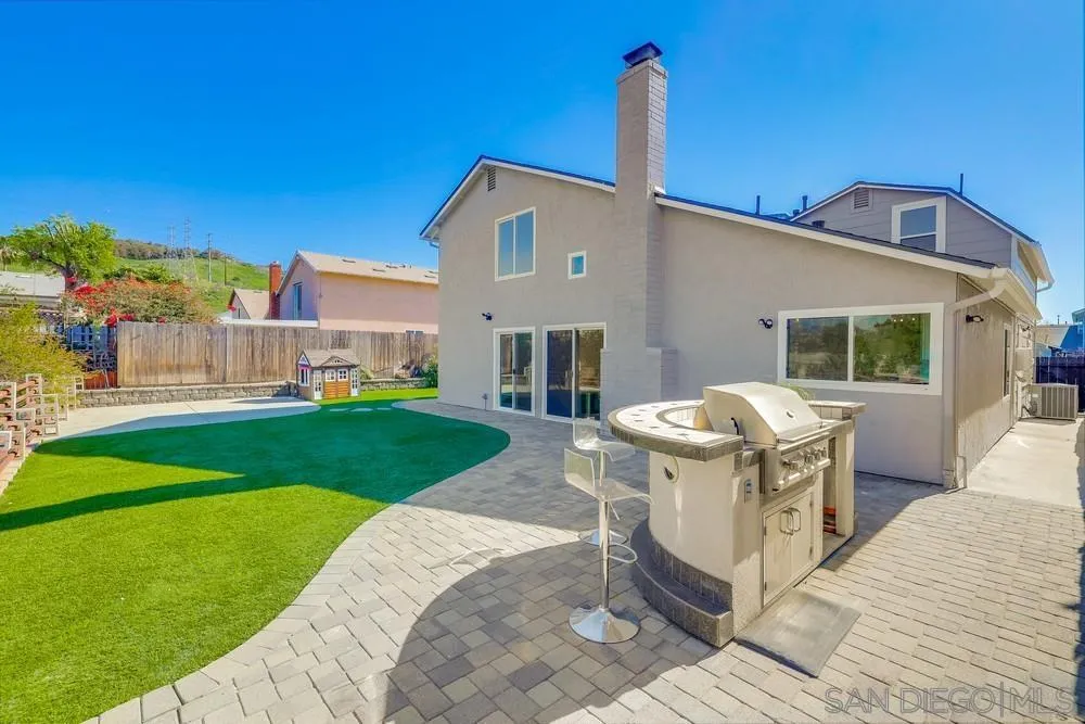 8779 Cordial Road El Cajon, CA 92021 - Photo 35 of 39 a view of a patio with a table and chairs