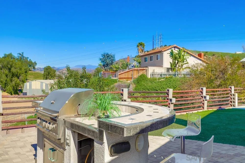 8779 Cordial Road El Cajon, CA 92021 - Photo 37 of 39 a view of a table and chairs in patio
