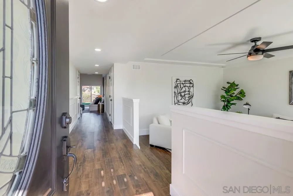 8779 Cordial Road El Cajon, CA 92021 - Photo 5 of 39 a view of a hallway view with staircase