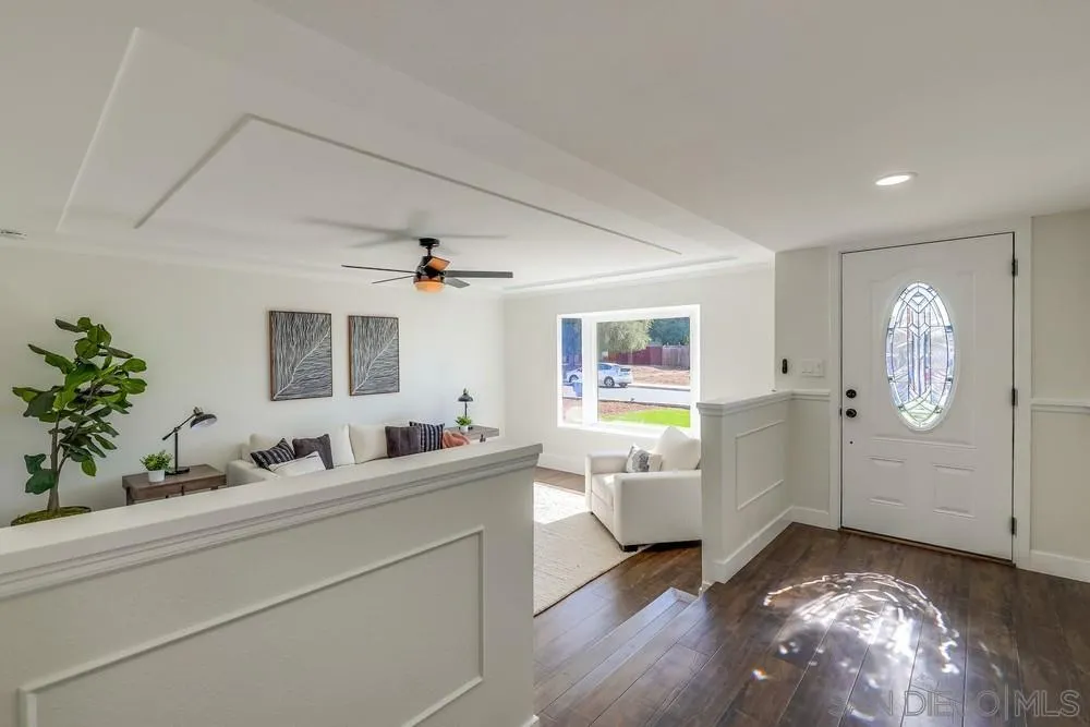 8779 Cordial Road El Cajon, CA 92021 - Photo 6 of 39 a living room with furniture and a potted plant