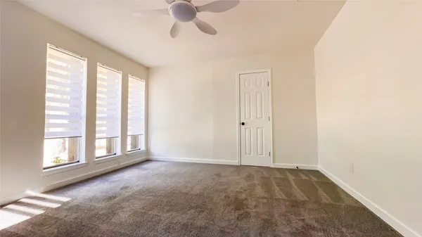 a bathroom with two sink and mirror