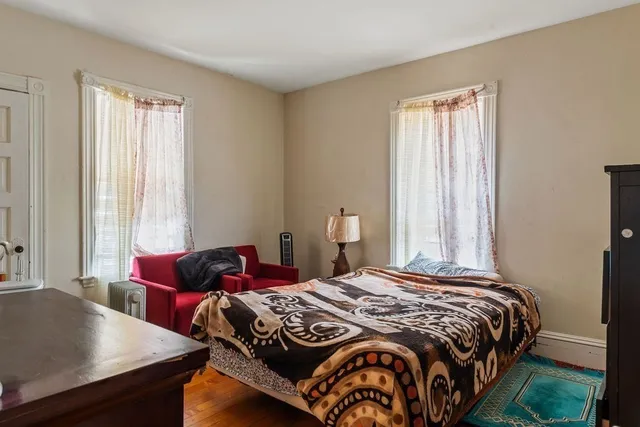 a room with a table and cabinets