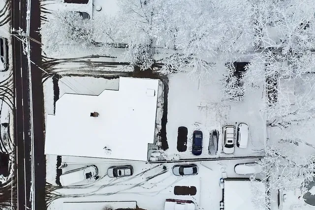 a view of building with large windows