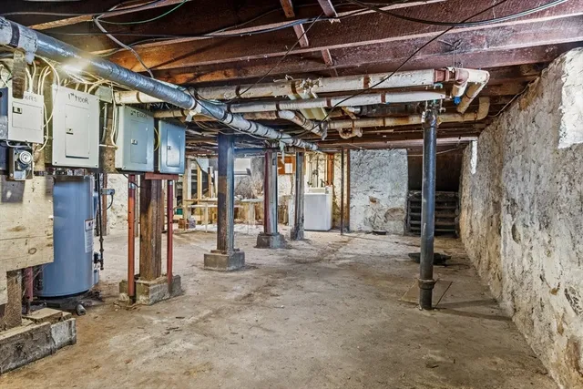 a view of a garage room with stairs