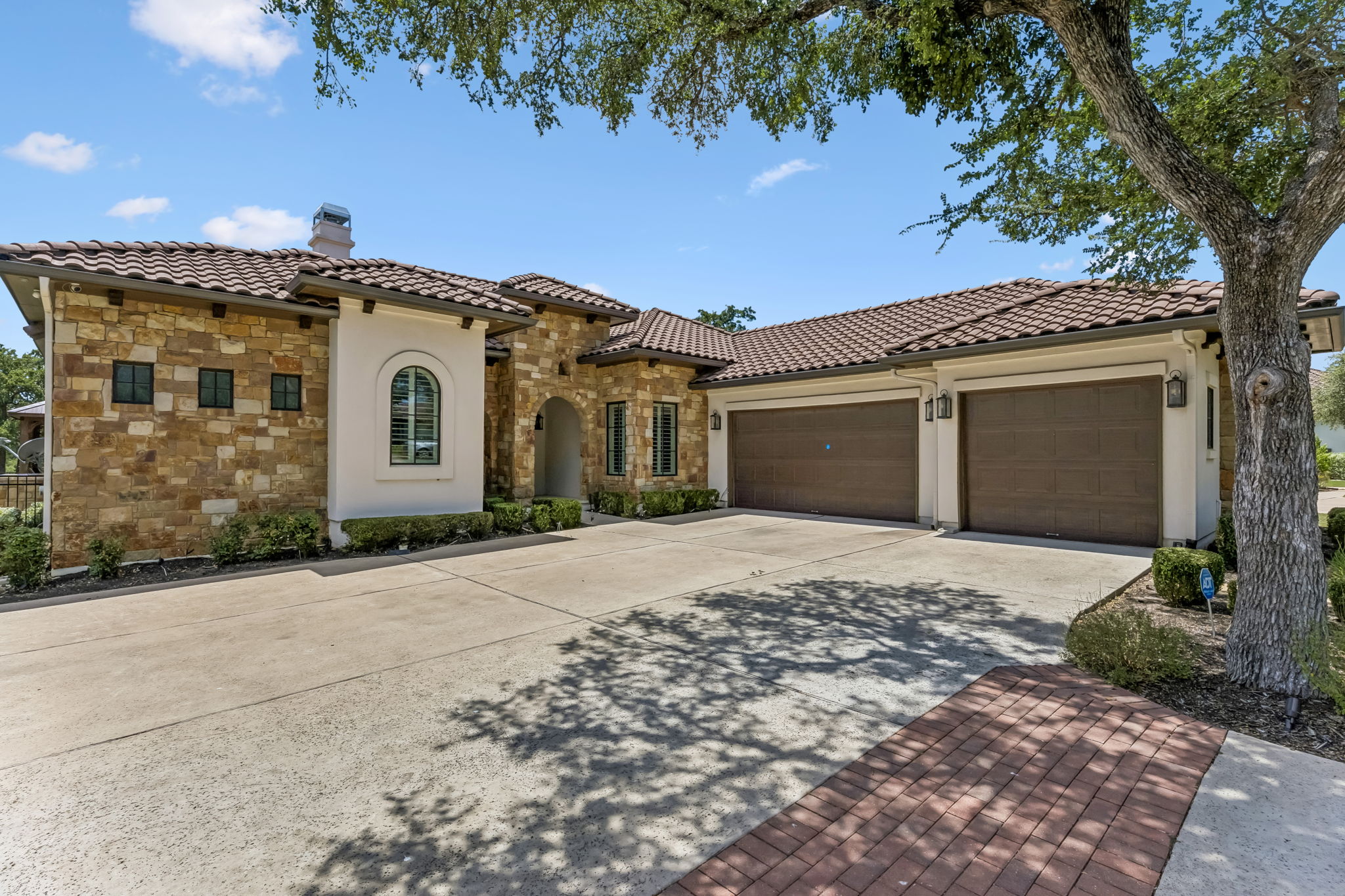 505 Flint Ridge Trail Georgetown, TX 78628 - Photo 34 of 40 A side-entry three-car garage enhances both functionality and architectural appeal.