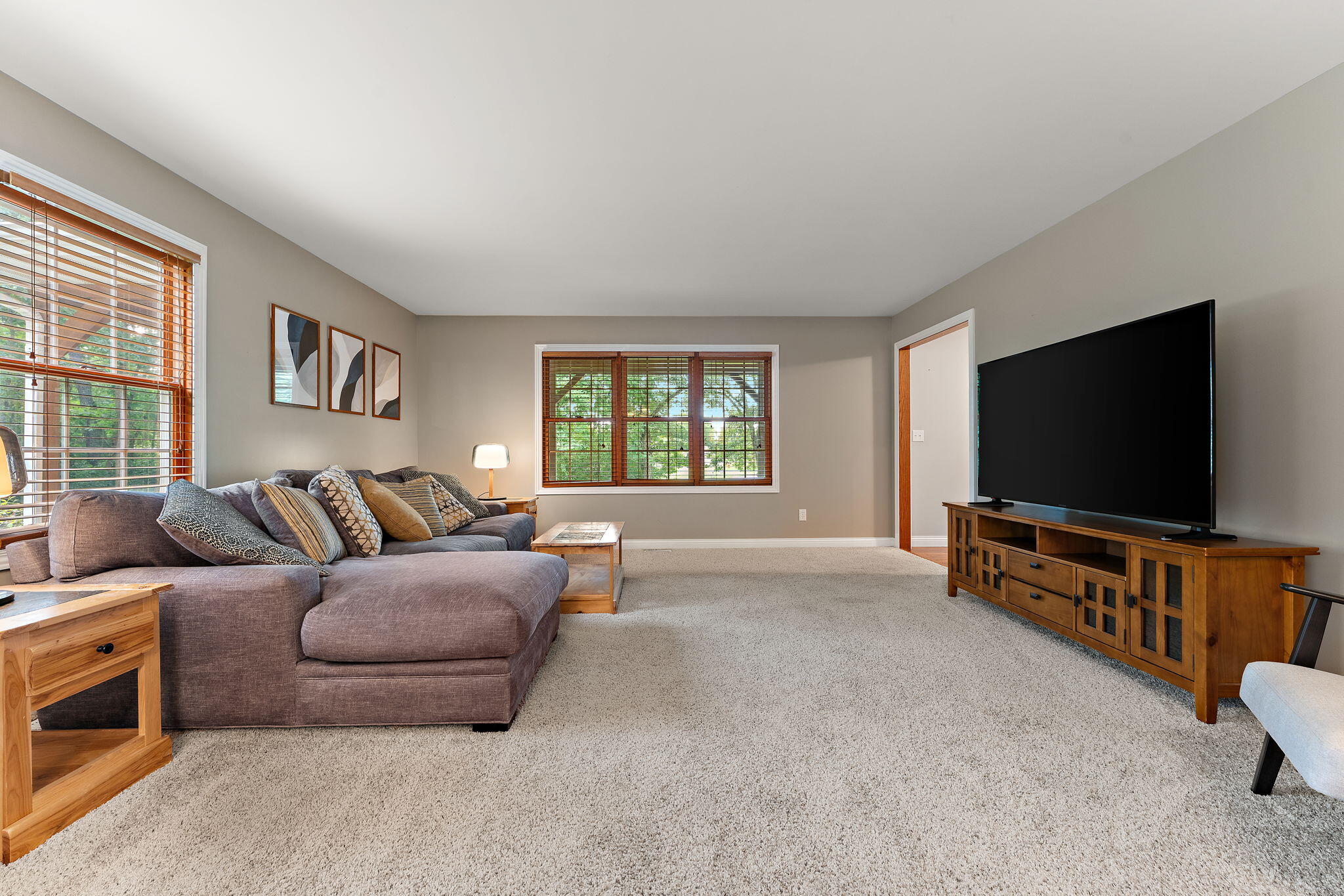 5338 East Lawler Court, Unit 67 Demotte, IN 46310 - Photo 12 of 49 a living room with furniture and a flat screen tv