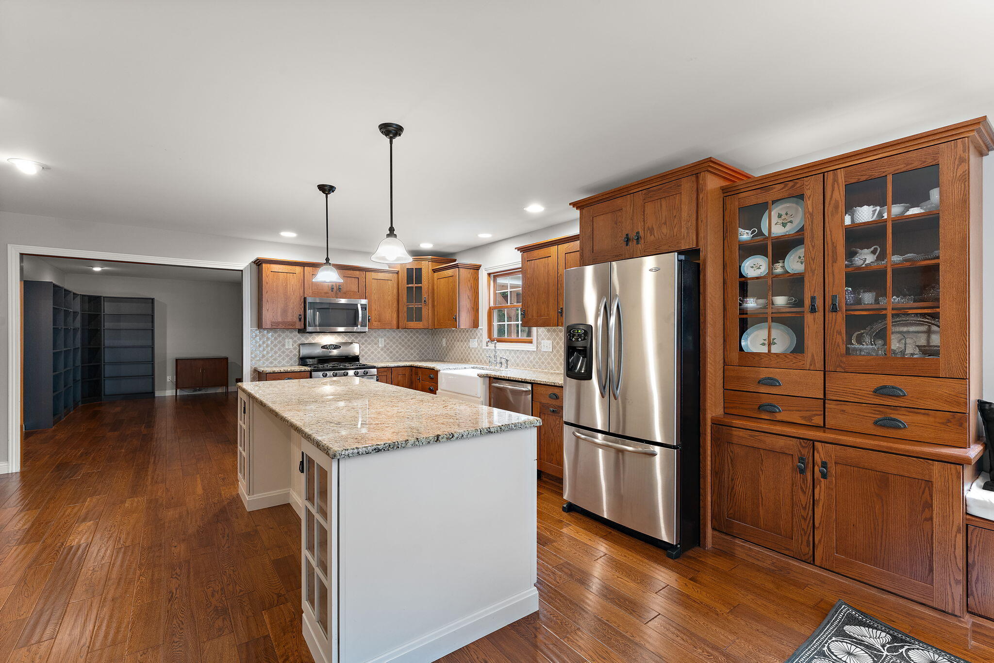 5338 East Lawler Court, Unit 67 Demotte, IN 46310 - Photo 15 of 49 a kitchen with stainless steel appliances granite countertop a refrigerator a stove and a sink
