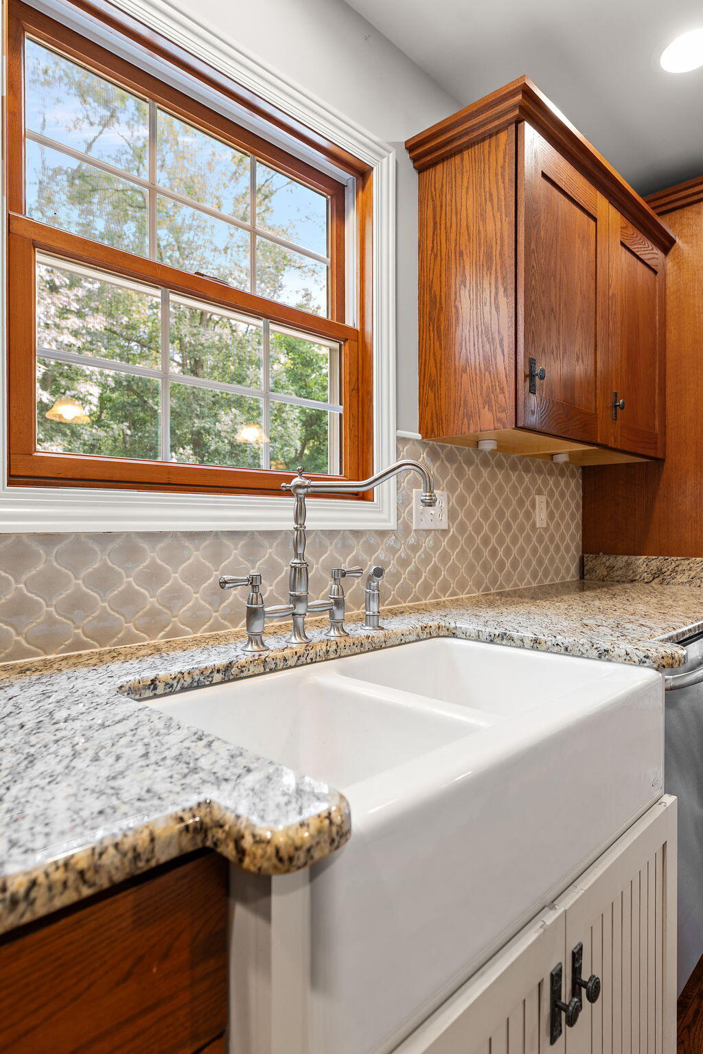 5338 East Lawler Court, Unit 67 Demotte, IN 46310 - Photo 19 of 49 a bathroom with a granite countertop sink and washing machine