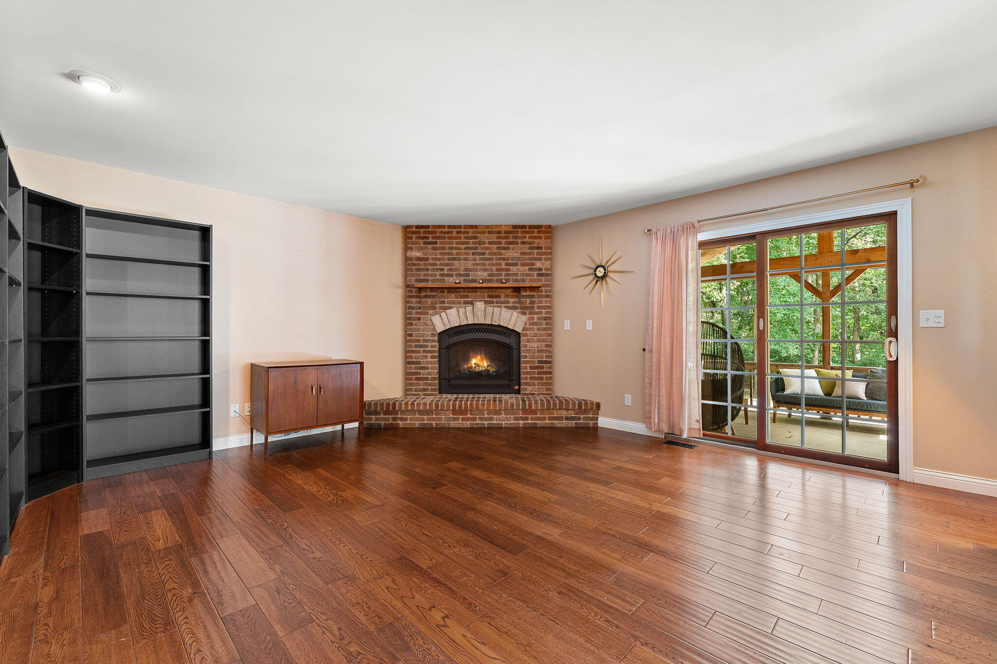 5338 East Lawler Court, Unit 67 Demotte, IN 46310 - Photo 22 of 49 wooden floor fireplace and natural light in room