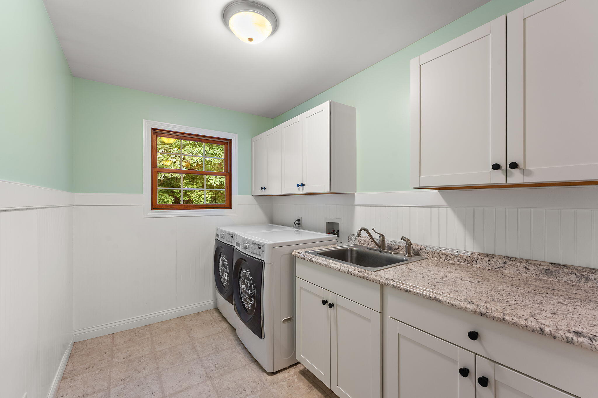 5338 East Lawler Court, Unit 67 Demotte, IN 46310 - Photo 23 of 49 a view of a kitchen with sink washer and dryer