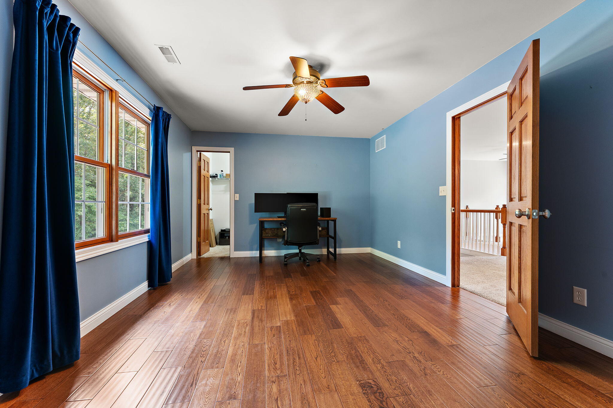 5338 East Lawler Court, Unit 67 Demotte, IN 46310 - Photo 30 of 49 a view of livingroom with hardwood floor and window
