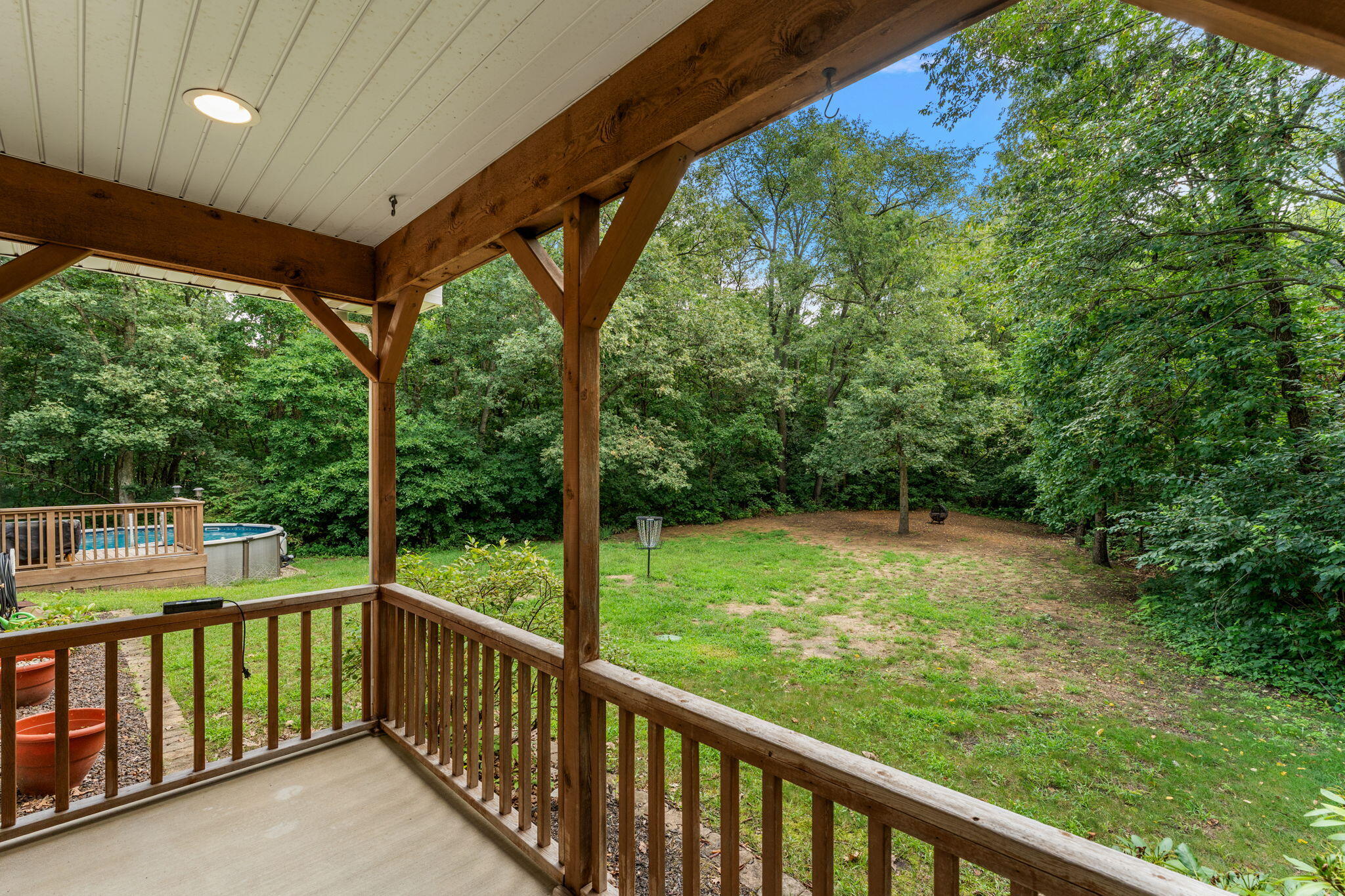 5338 East Lawler Court, Unit 67 Demotte, IN 46310 - Photo 35 of 49 a view of a balcony with furniture