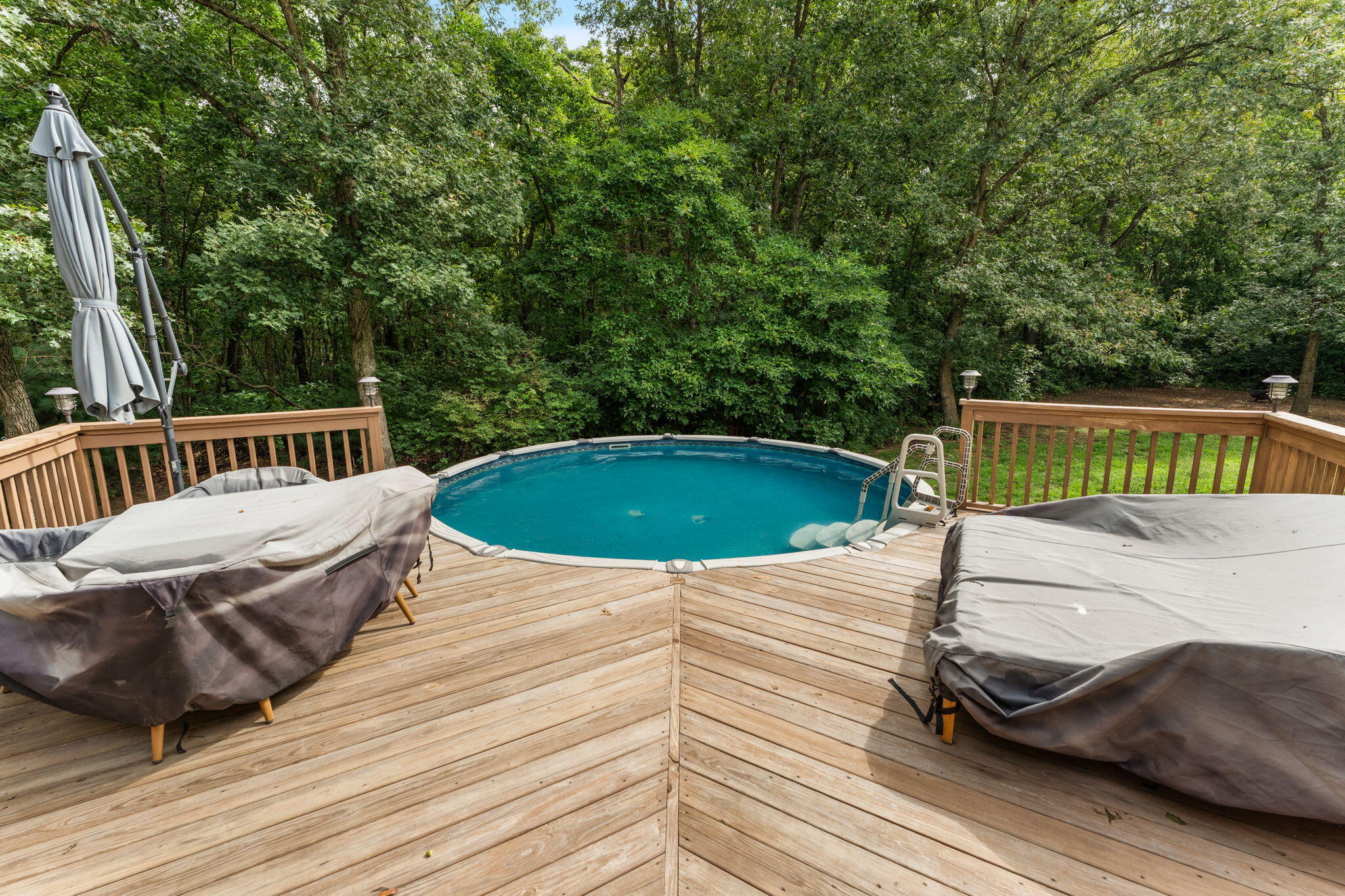 5338 East Lawler Court, Unit 67 Demotte, IN 46310 - Photo 41 of 49 a view of a swimming pool with a patio