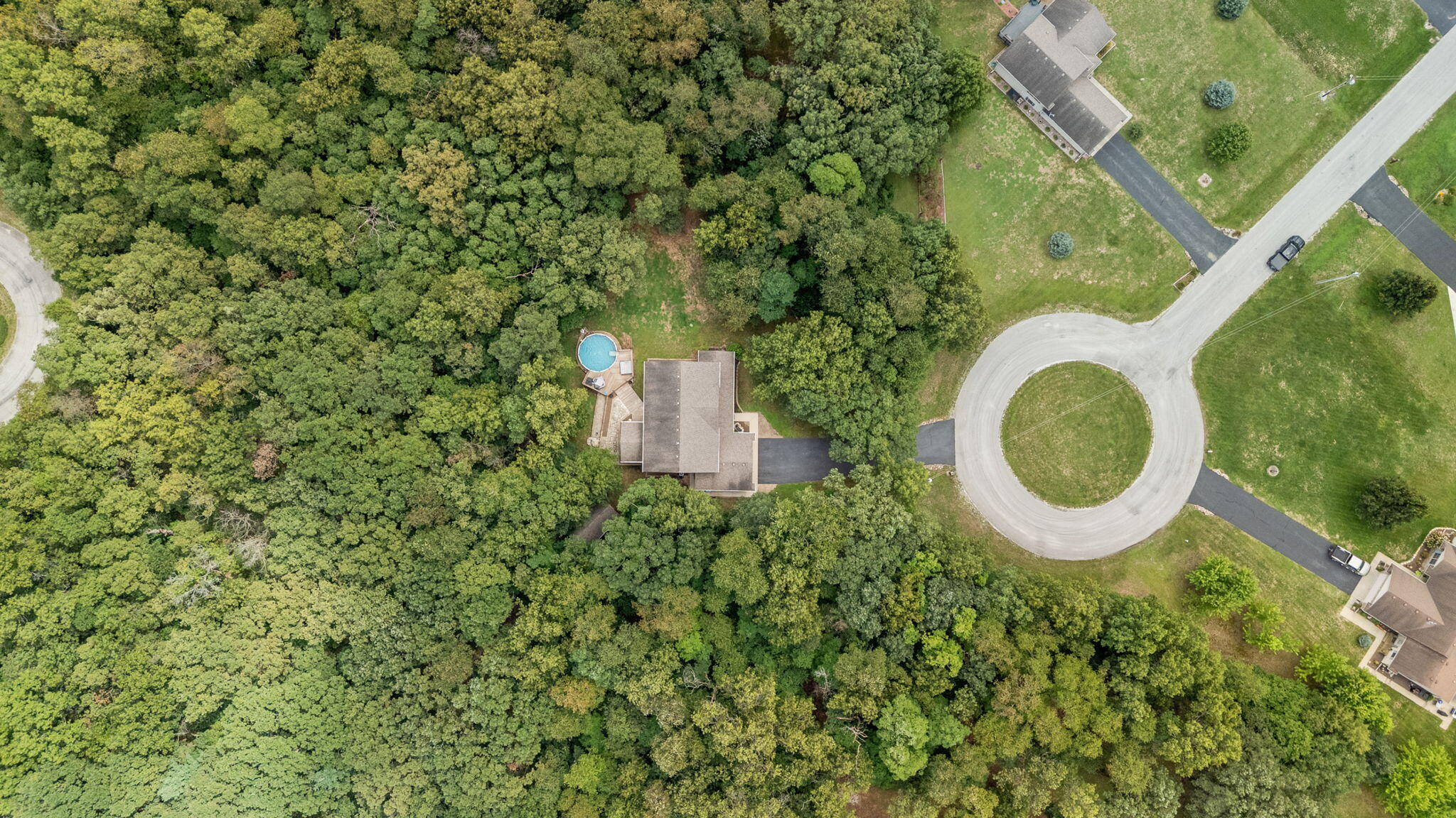 5338 East Lawler Court, Unit 67 Demotte, IN 46310 - Photo 6 of 49 an aerial view of a house with a yard and outdoor seating