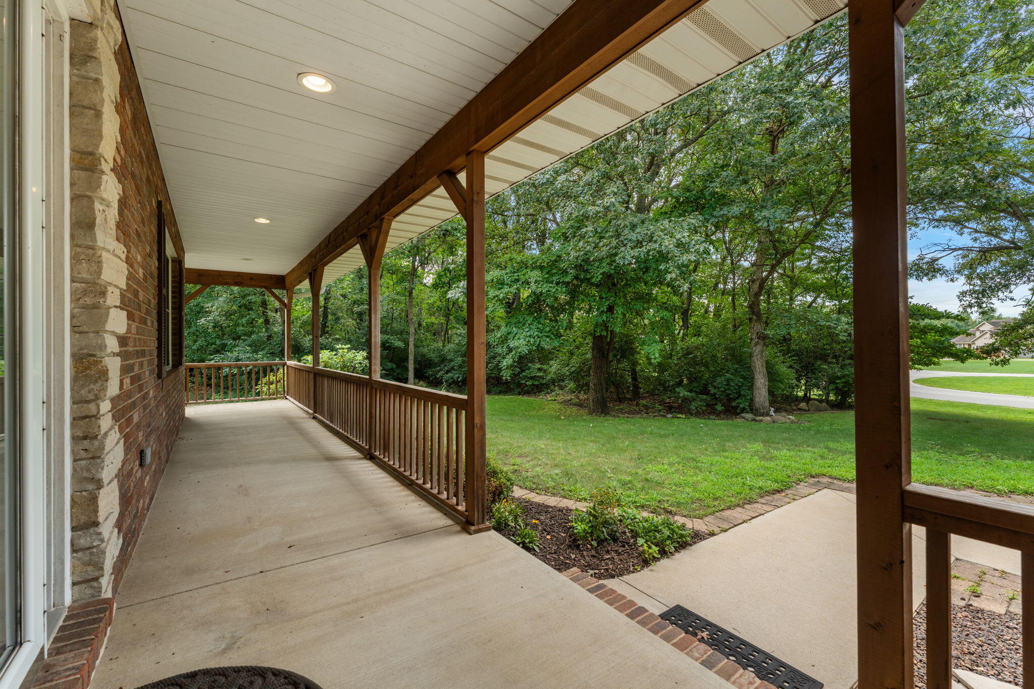 5338 East Lawler Court, Unit 67 Demotte, IN 46310 - Photo 8 of 49 a view of a porch