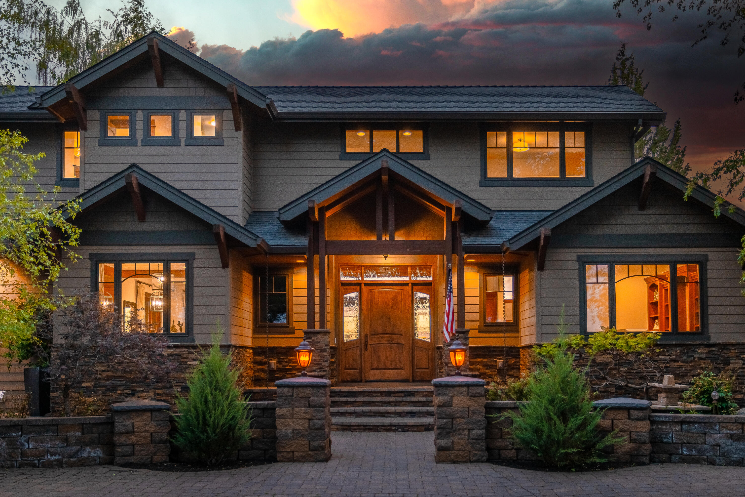 61405 Ward Road Bend, OR 97702 - Photo 1 of 37 a front view of a house with garden
