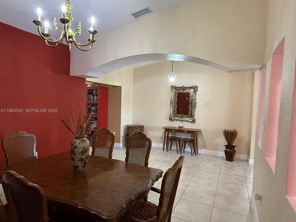 a view of a dining room with furniture