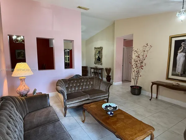 a living room with furniture and a couch
