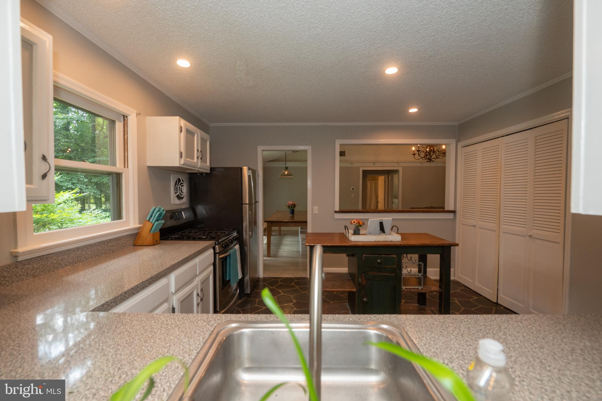 31091 Carioca Road Delmar, MD 21875 - Photo 12 of 28 a view of a living room and dining room