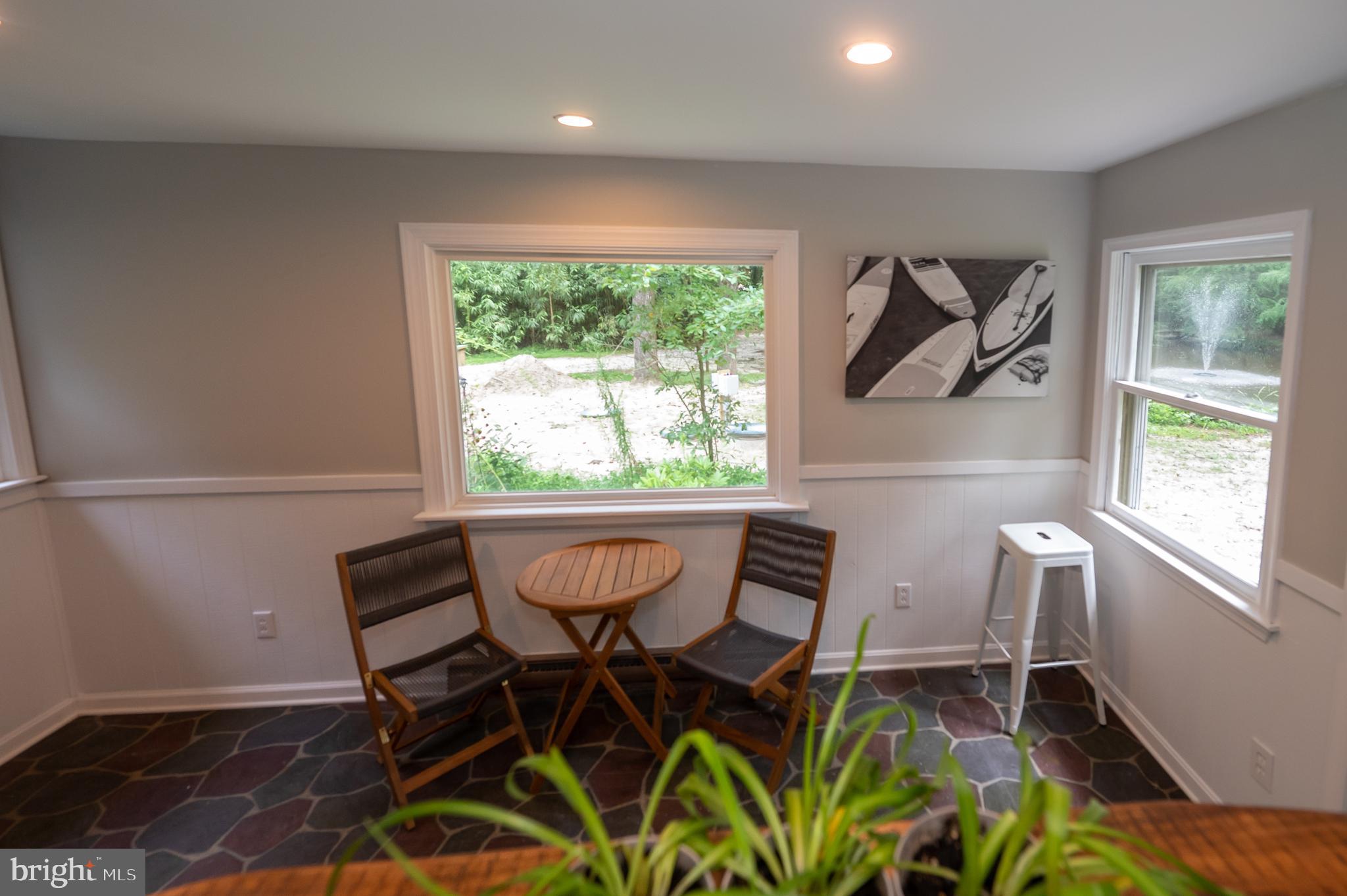 31091 Carioca Road Delmar, MD 21875 - Photo 15 of 28 a view of a dining room with furniture window and outside view
