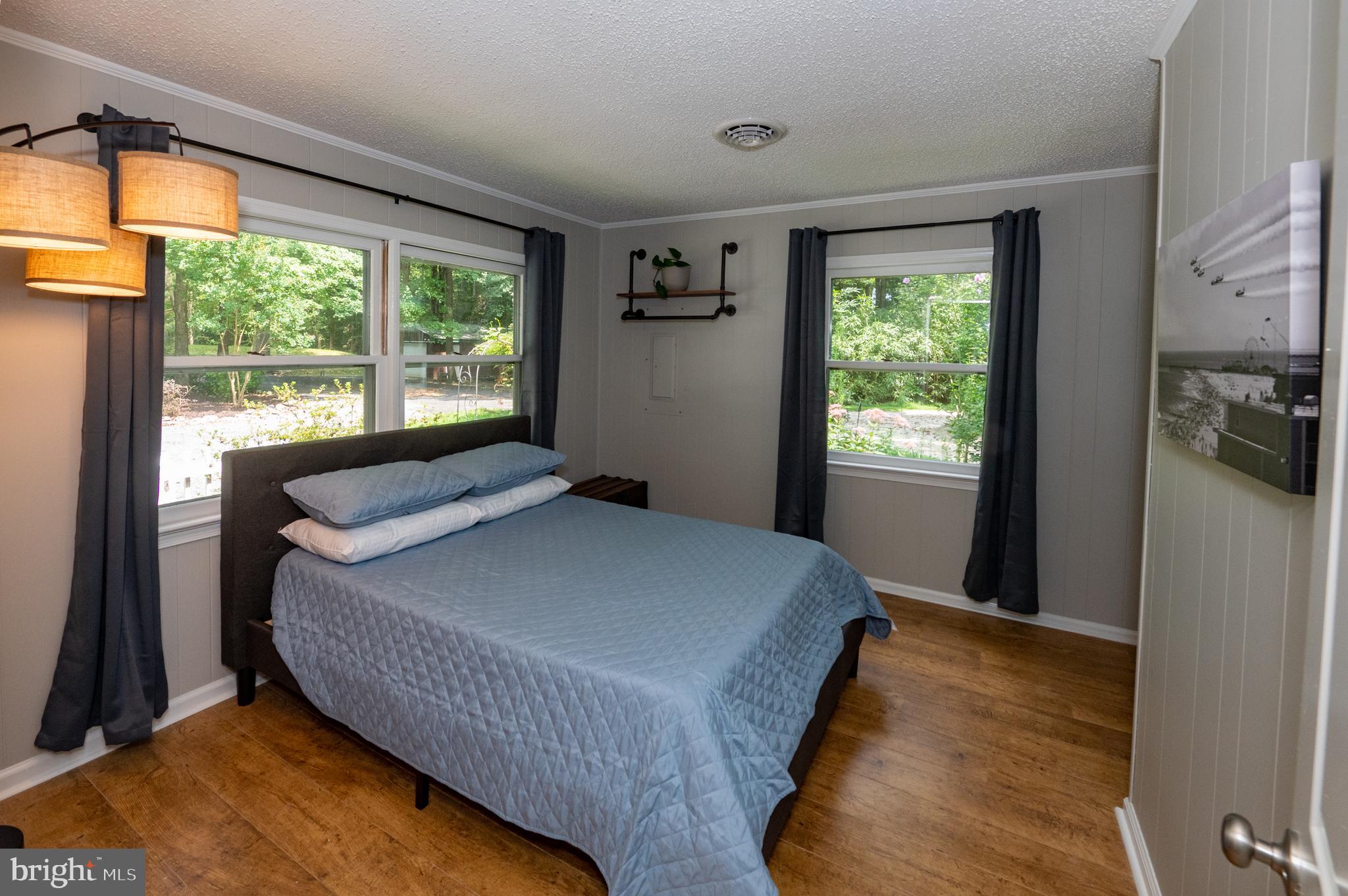 31091 Carioca Road Delmar, MD 21875 - Photo 16 of 28 a bedroom with a bed and a window
