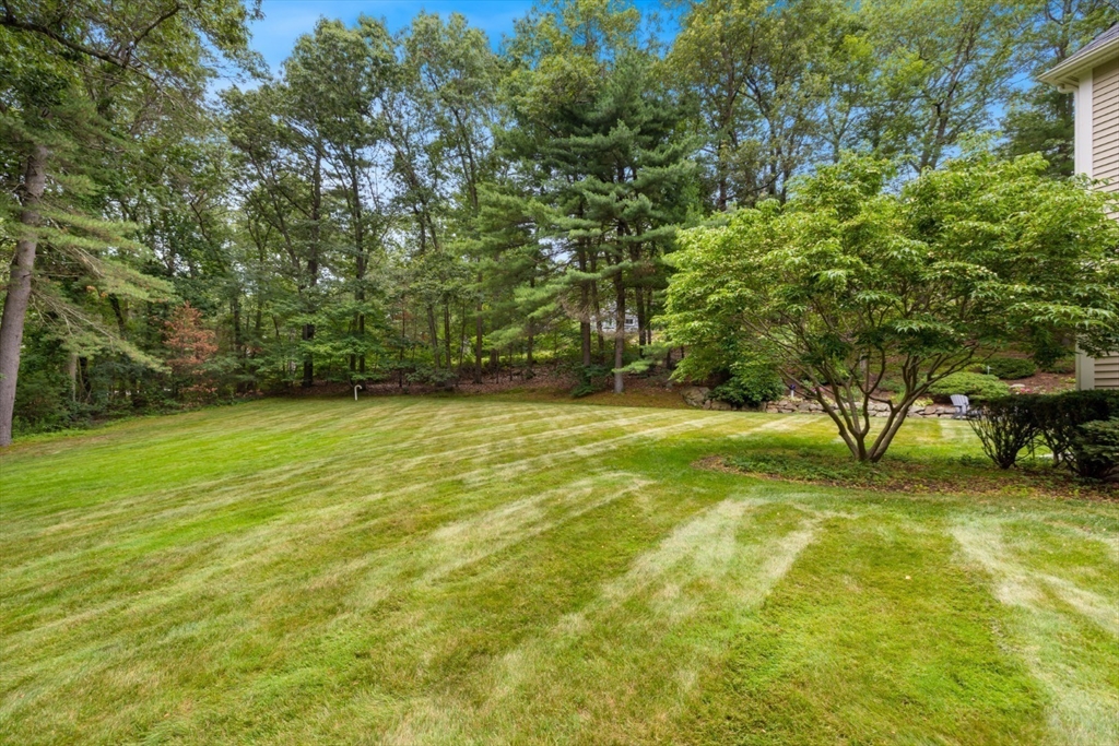 105 Flint Farm Road Middleton, MA 01949 - Photo 21 of 25 a view of an outdoor space and a yard
