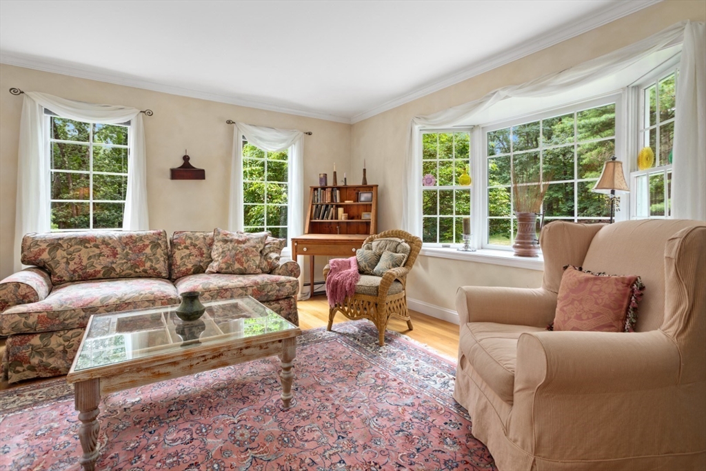 105 Flint Farm Road Middleton, MA 01949 - Photo 5 of 25 a living room with furniture and a large window
