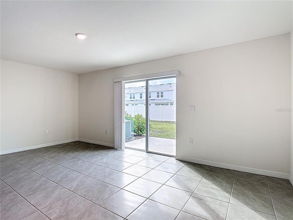 6632 Druid Way St. Cloud, FL 34773 - Photo 11 of 38 a view of an empty room with a window