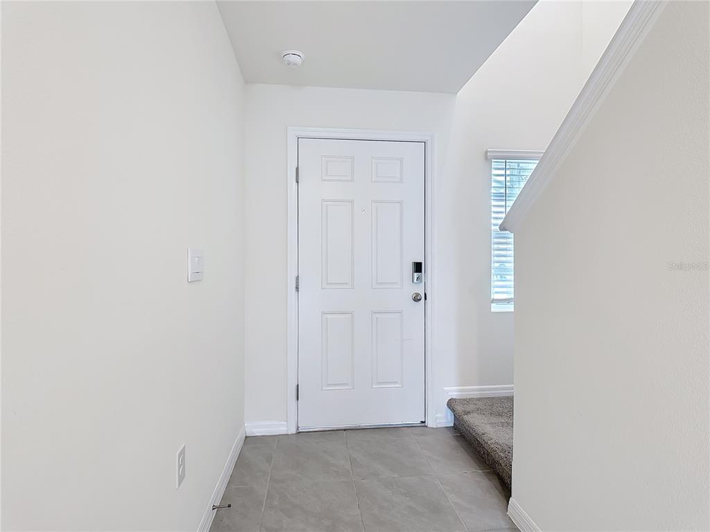 6632 Druid Way St. Cloud, FL 34773 - Photo 16 of 38 a view of room with window