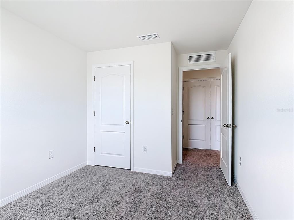 6632 Druid Way St. Cloud, FL 34773 - Photo 19 of 38 a view of an empty room