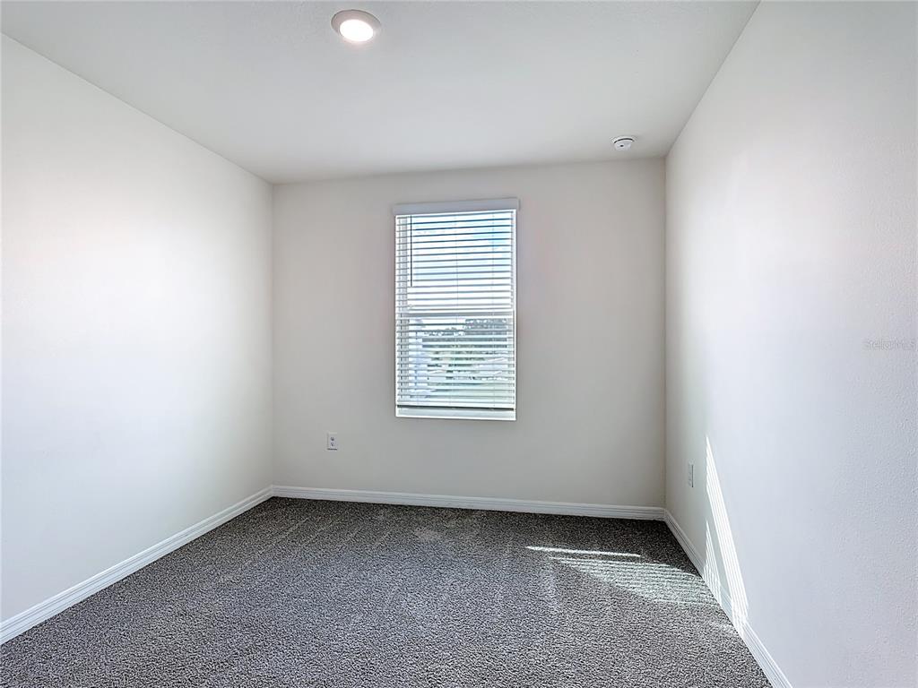 6632 Druid Way St. Cloud, FL 34773 - Photo 20 of 38 an empty room with a window