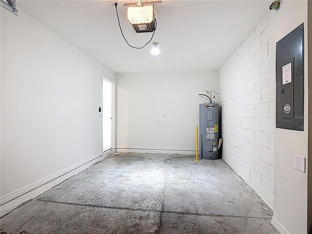 6632 Druid Way St. Cloud, FL 34773 - Photo 21 of 38 a view of a room with racks on the wall