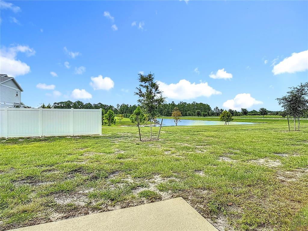 6632 Druid Way St. Cloud, FL 34773 - Photo 32 of 38 a view of a green field