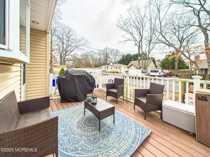 a living room with patio a couch and a fireplace