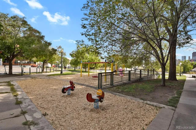 a parked cars parked in front of a building