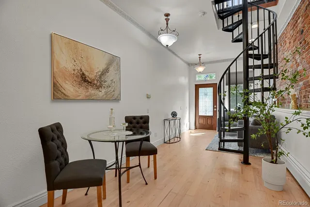 a view of a livingroom with furniture and a couch