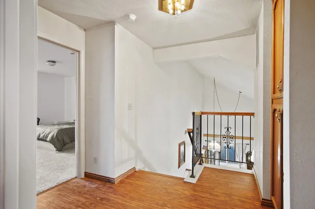 a view of entryway with wooden floor