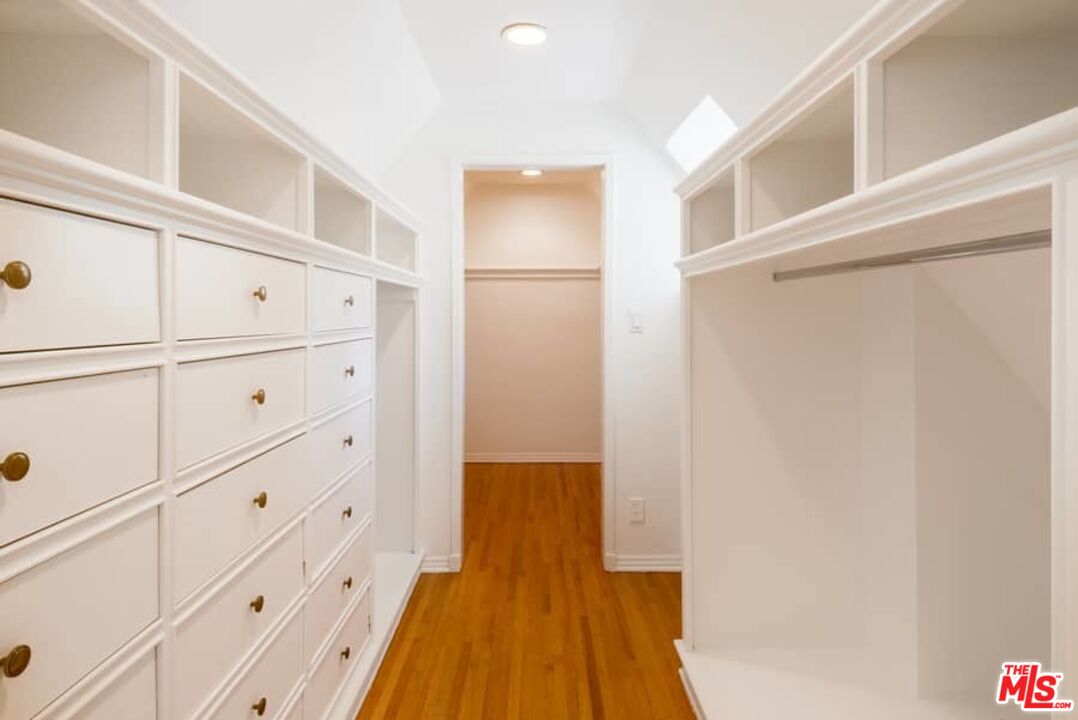 1957 Mandeville Canyon Road Los Angeles, CA 90049 - Photo 32 of 54 a view of closet