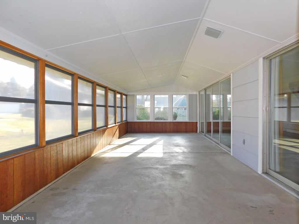 2 Falcon Road Levittown, PA 19056 - Photo 8 of 48 Rear Screened In Covered Patio