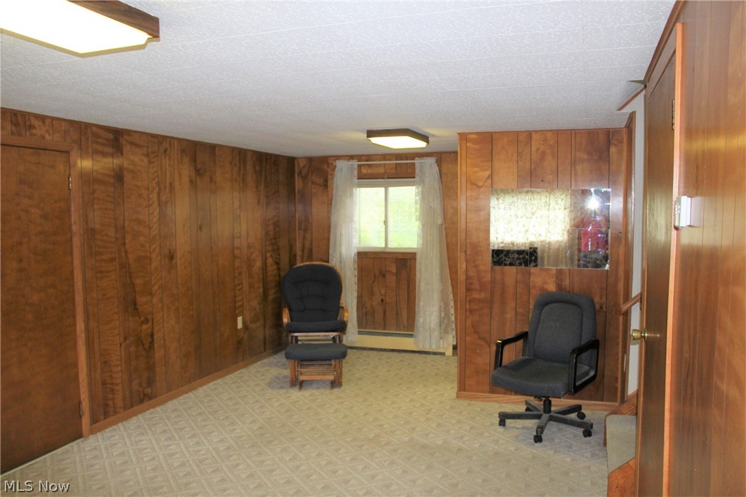 4490 Beach Road Medina, OH 44256 - Photo 23 of 35 Family room with 1/2 bath in back corner
