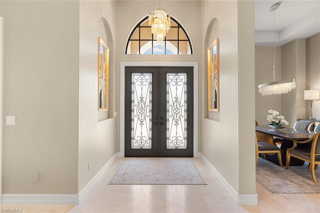 7400 Byrons Way Naples, FL 34113 - Photo 30 of 50 a view of livingroom with furniture and window