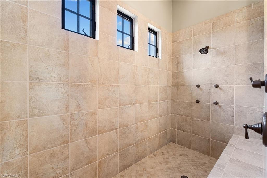 7400 Byrons Way Naples, FL 34113 - Photo 34 of 50 a bathroom with a shower