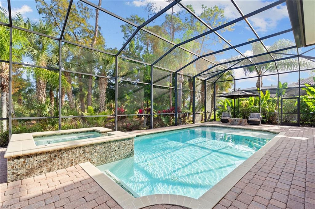 7400 Byrons Way Naples, FL 34113 - Photo 40 of 50 a view of indoor pool and sitting area