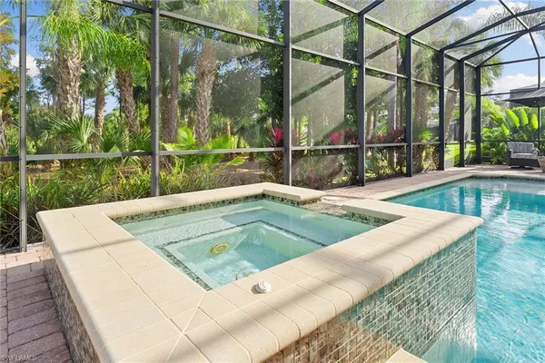 a view of a swimming pool with a patio