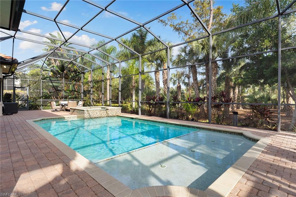 7400 Byrons Way Naples, FL 34113 - Photo 45 of 50 a view of yard with patio