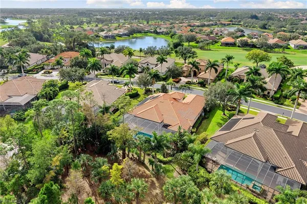 an aerial view of residential house with outdoor space and river