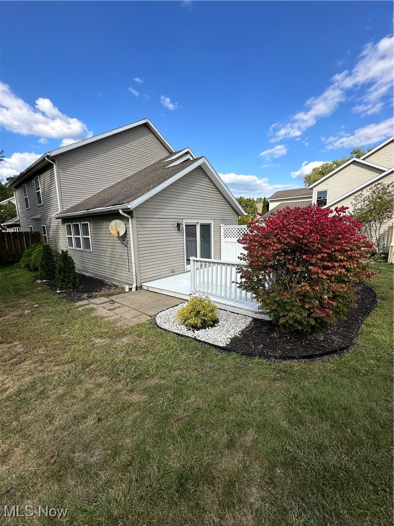 5205 Cline Road, Unit A Kent, OH 44240 - Photo 17 of 23 Rear view of house with a wooden deck, a patio, and a shingled roof